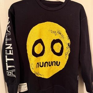 Nununu BOYS 7/8 Black Crewneck with Bold Yellow Face Graphic